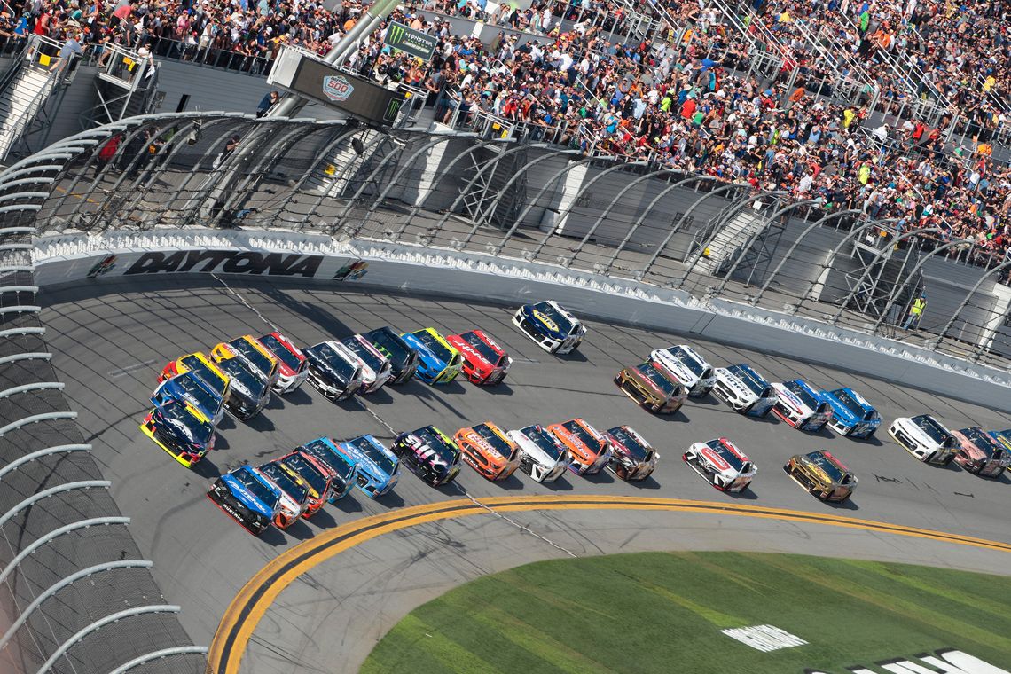 cars line up as they race around the Dayton 500 circuit