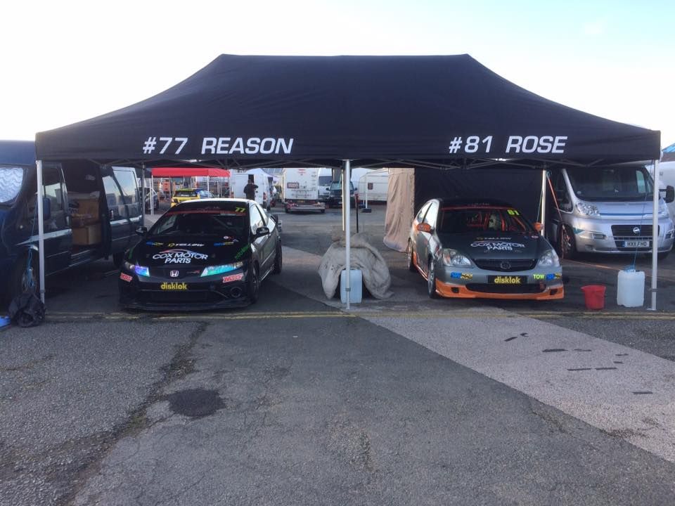 2 cars beneath a 4m x 8m pop up race tent