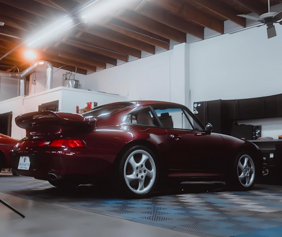 burgundy porsche 911 garage