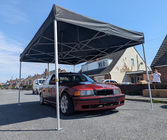 bmw drift car under heavy duty gala performance pop up gazebo