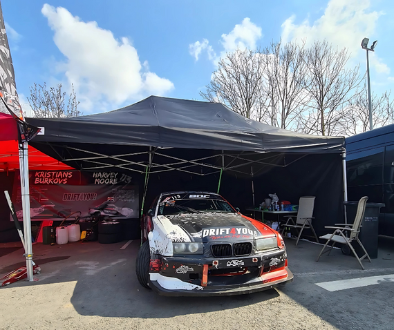 drift car under black race awning bmw drift4you