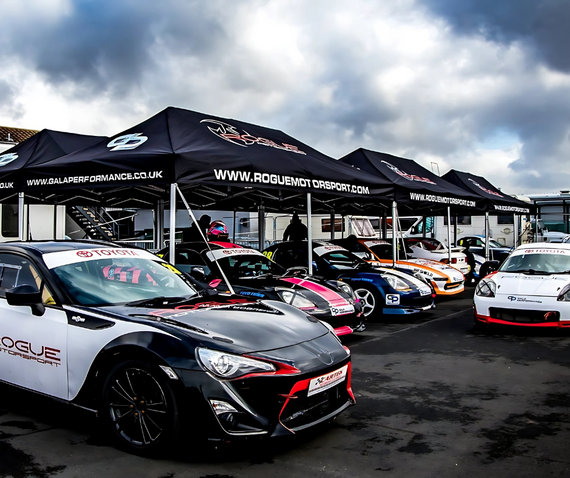kode motorsport drift car under branded pop up gazebo