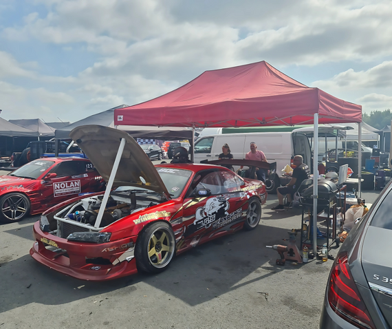 red nissan silvia motorsport gazebo paddock setup