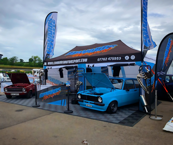 toyota gt86 and mr2 race cars under rogue motorsport awnings