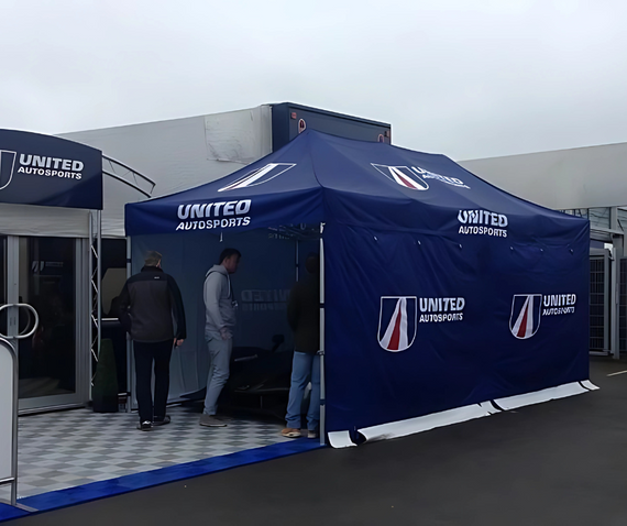 united autosports blue race tent jpg